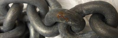 Rusty mark on galvanised chain