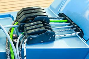 Passing the end through a jammer or clutch